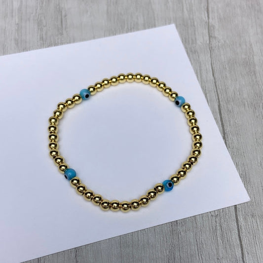 PULSERA RESORTADA OJITOS